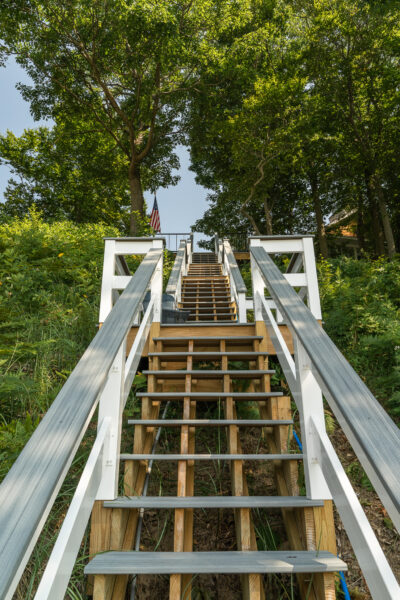 Gray Trex custom beach stairs to lake Michigan